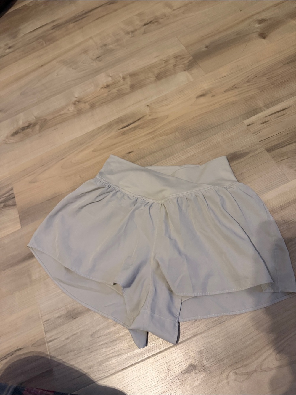 size medium tan crossover flowy shorts